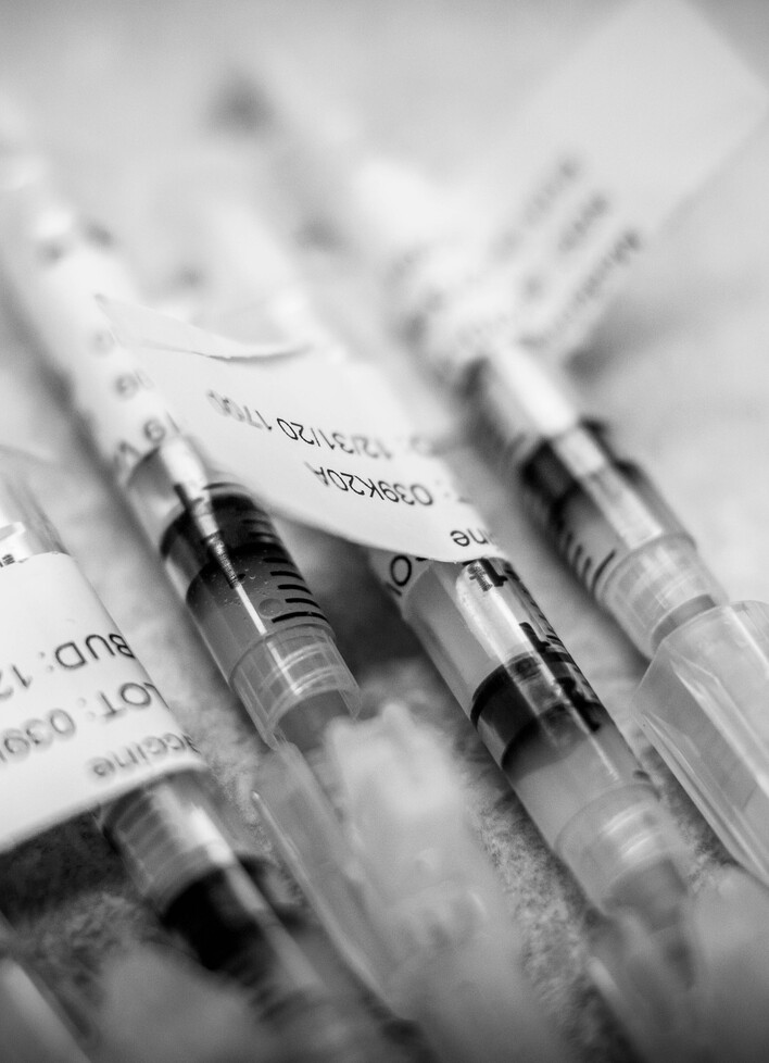 covid vaccines black and white