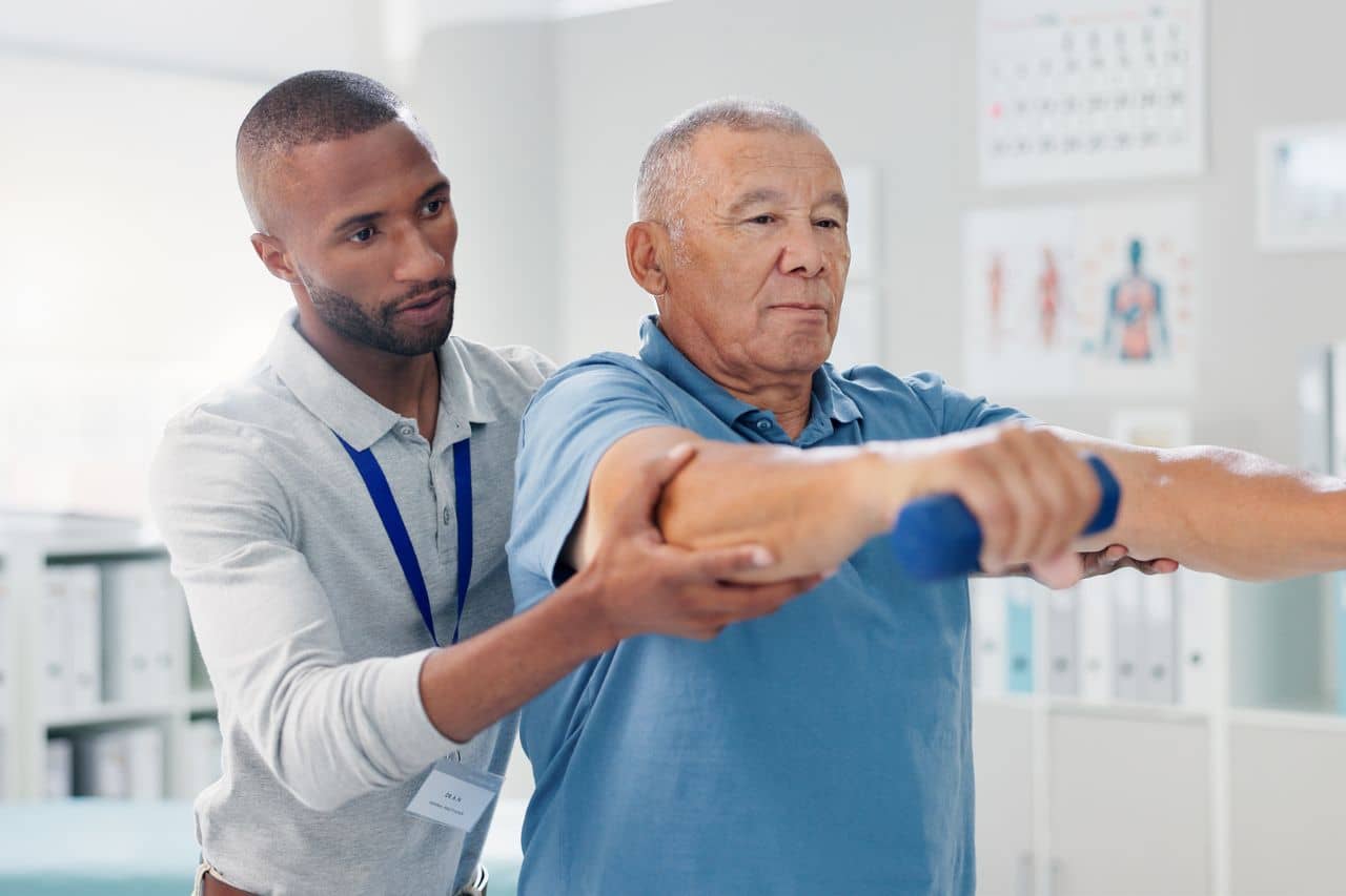 A man with a physical therapist