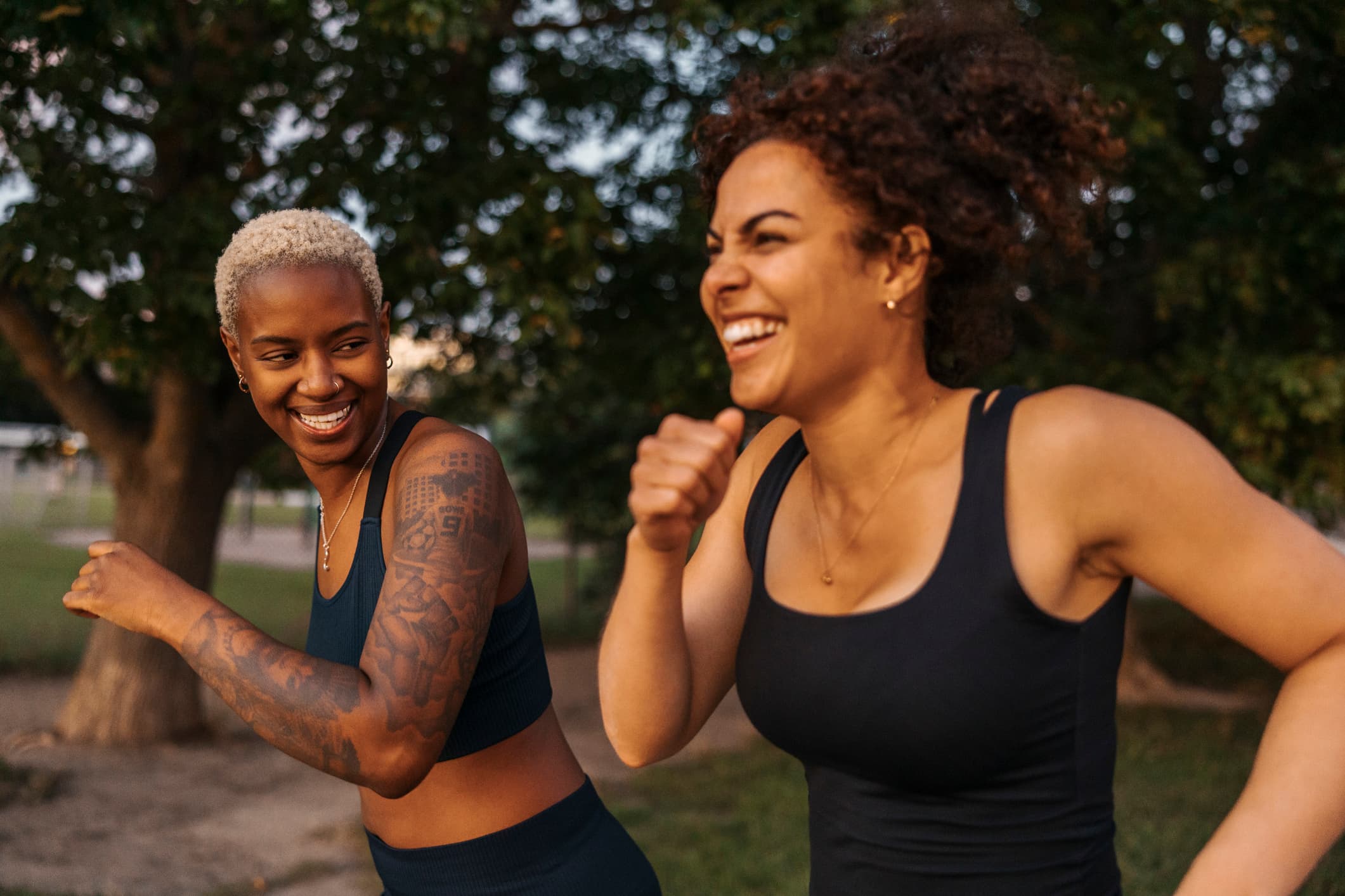 Two Women Running Outside