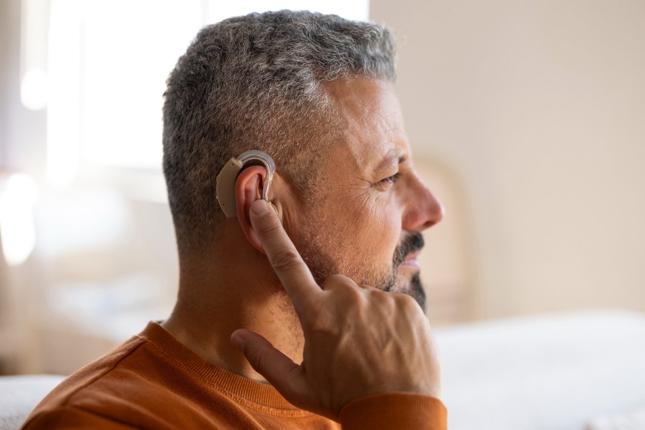 Man using hearing aids