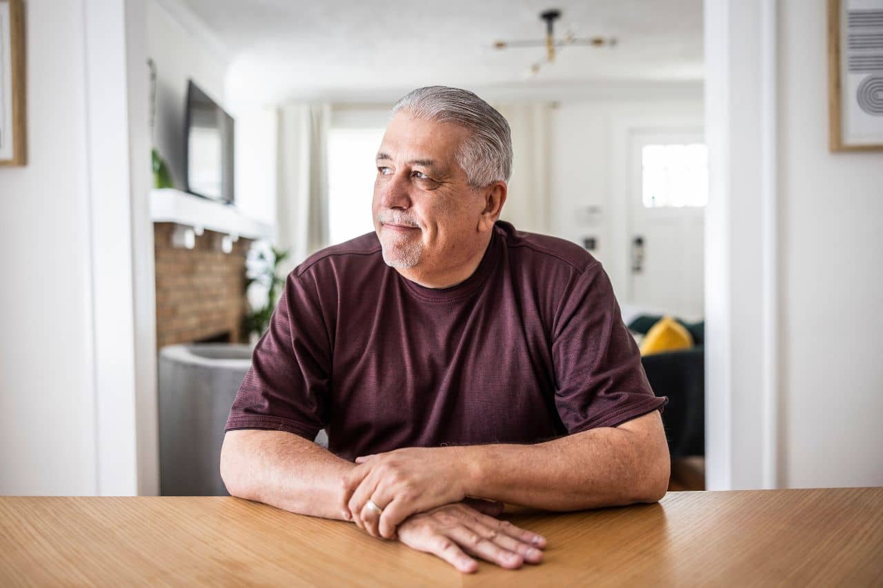 Man sitting and looking to the side