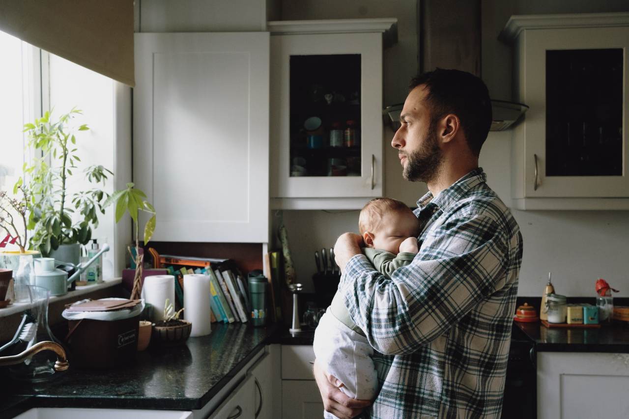 Father holding a baby