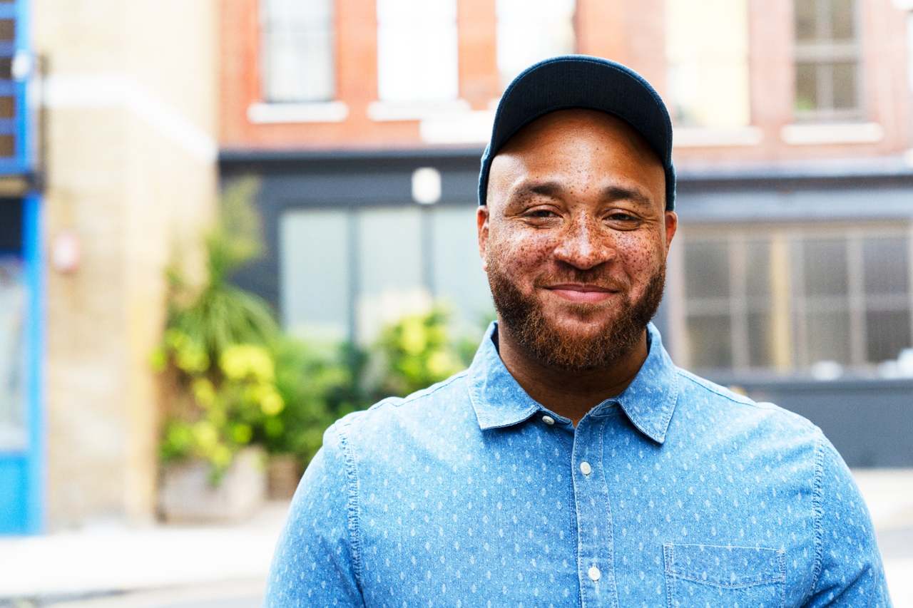 Man smiling in a hat