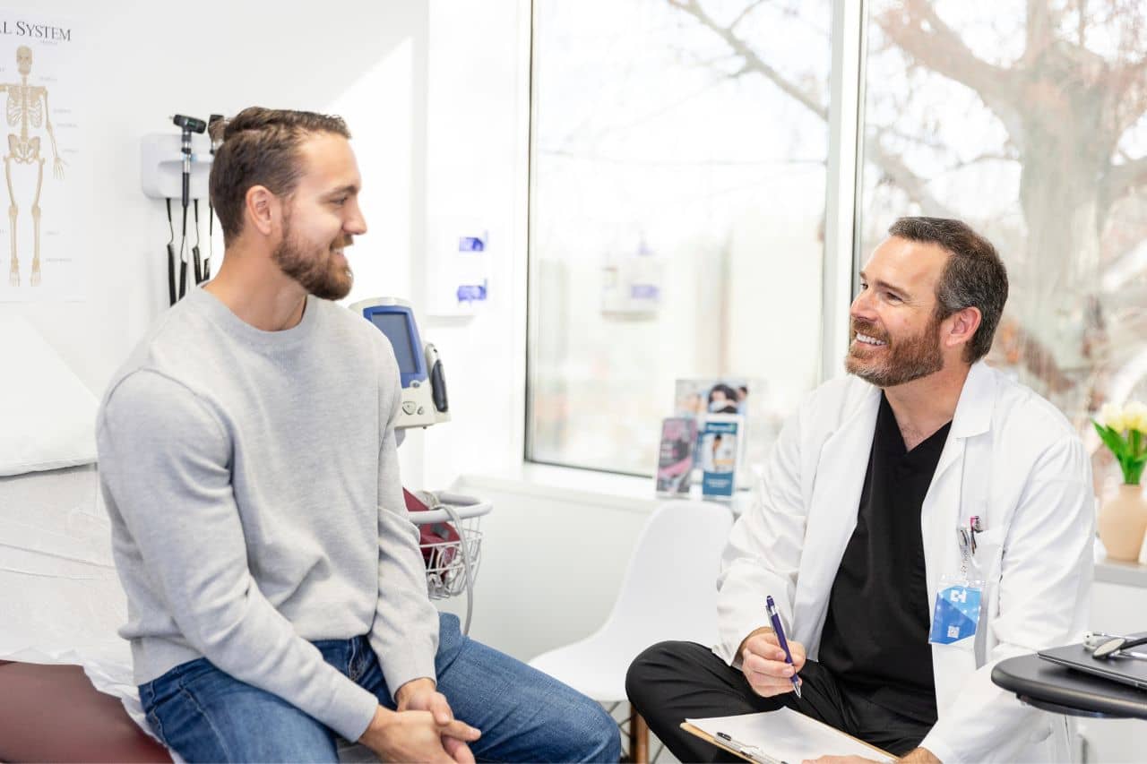 Man talking with a doctor