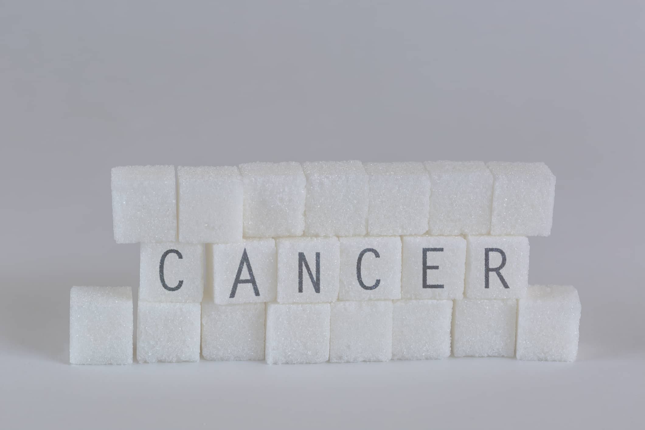 Sugar Cubes with Cancer Written on Them