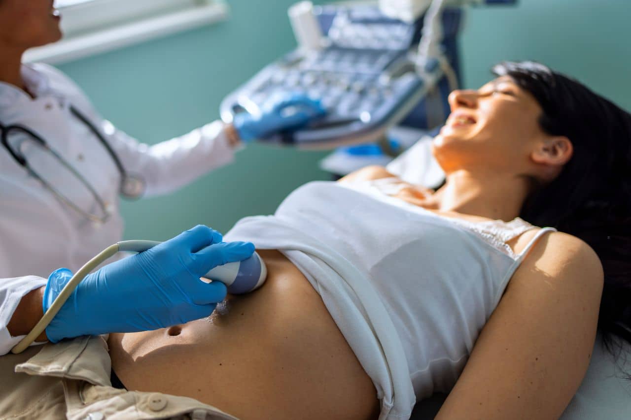 Woman getting examined by a doctor