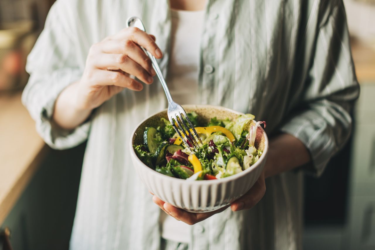 woman eating healthy meal