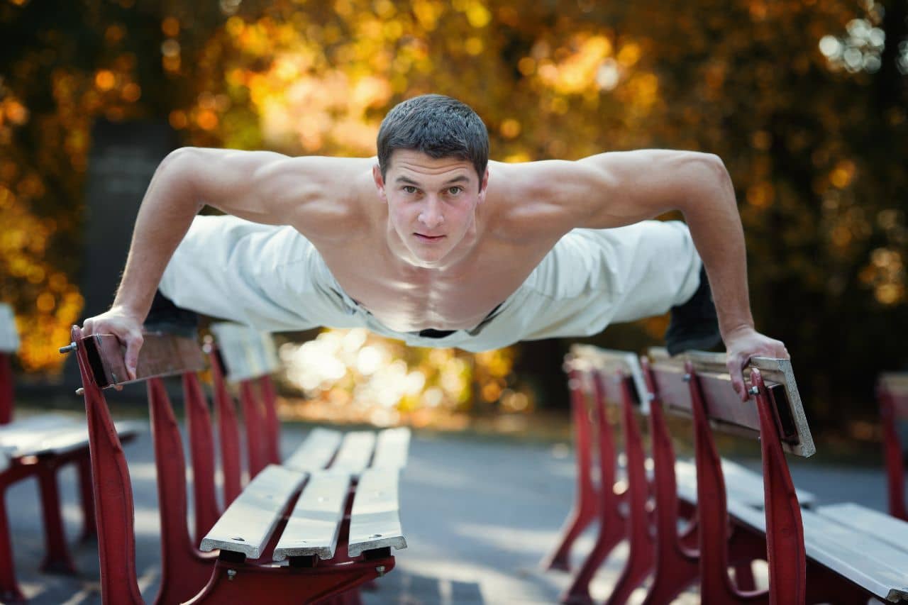Man doing quadrobics in the park