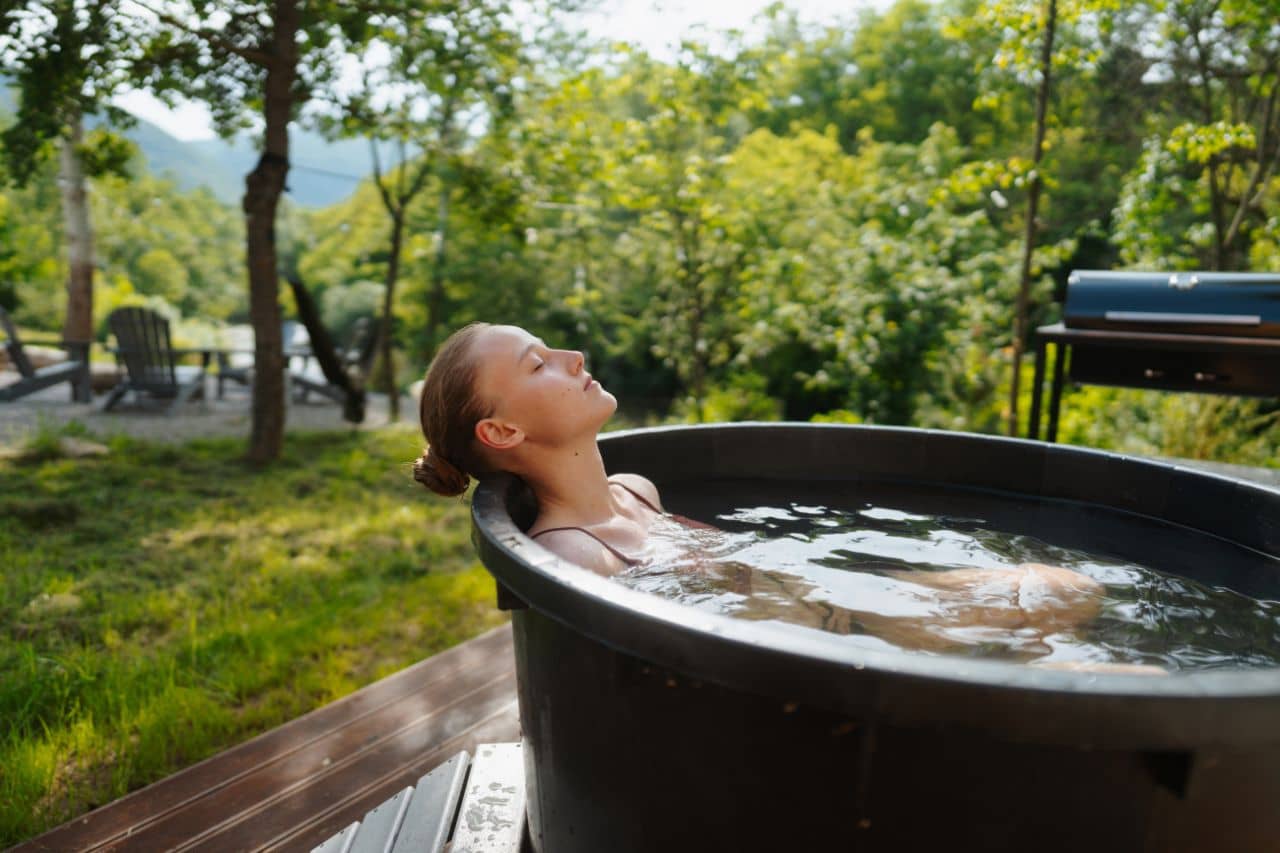 Woman in a cold plunge tub