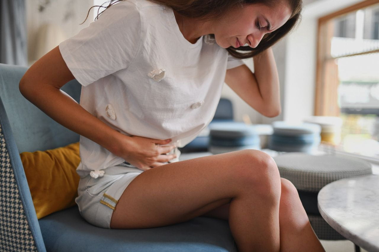 Woman holding her stomach