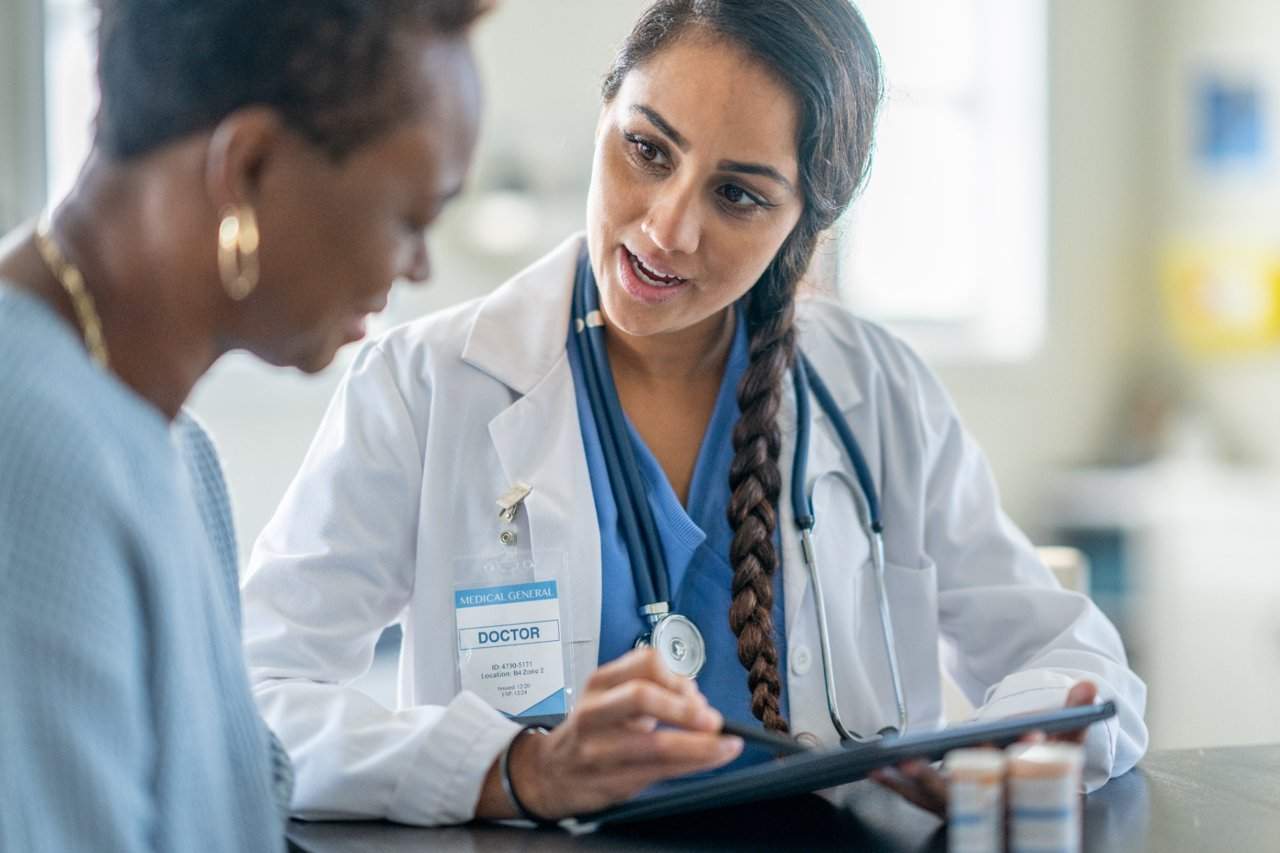 Doctor talks to a patient