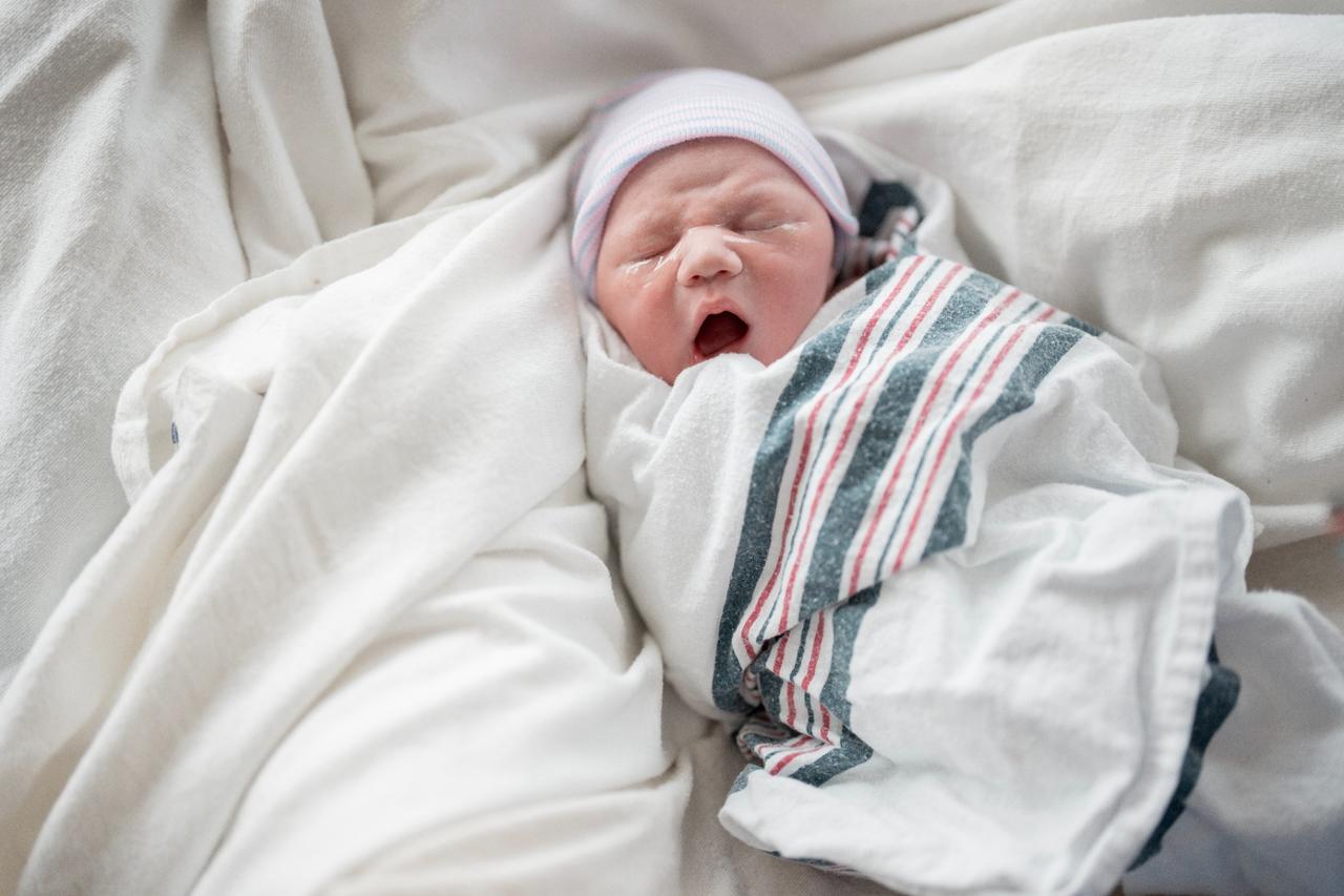 Newborn baby swaddled