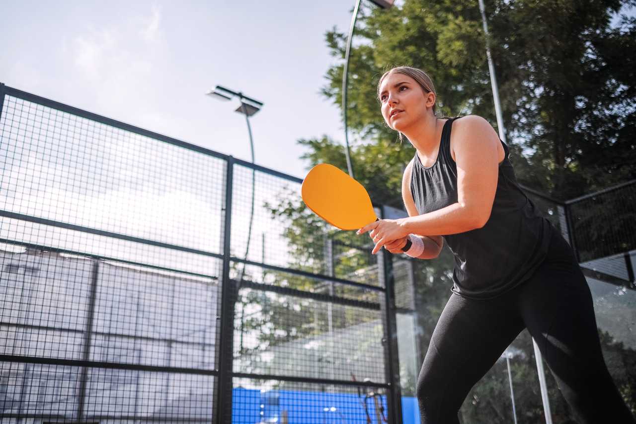 Woman playing pickleball