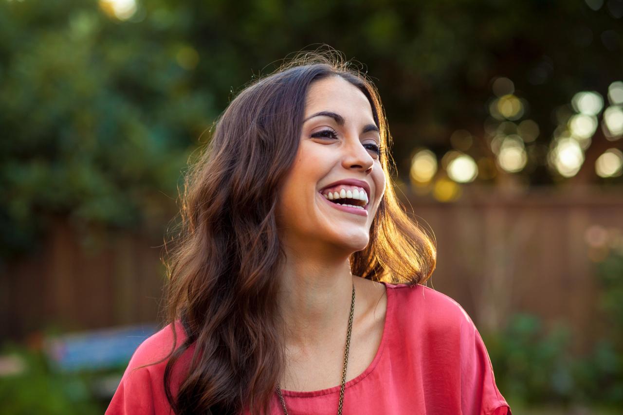 Woman smiling outdoors