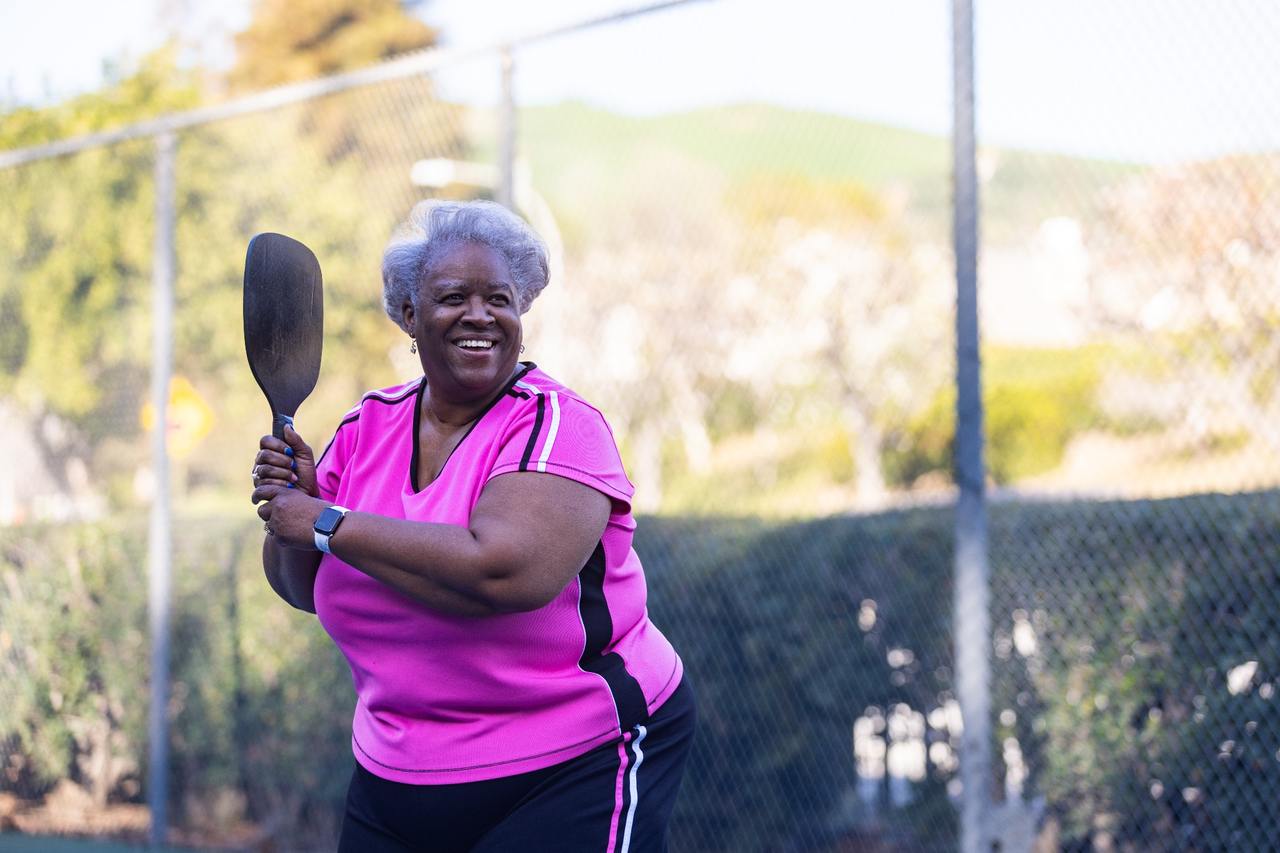 Senior woman playing pickleball