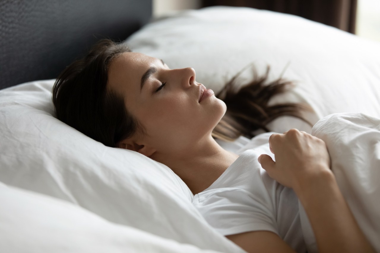 Woman sleeping on her back