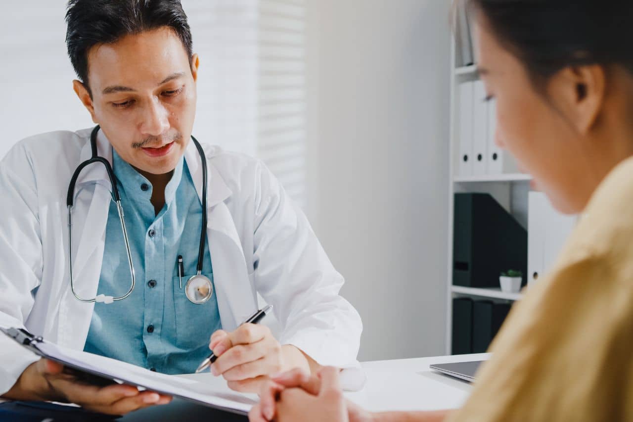 Woman with urologist