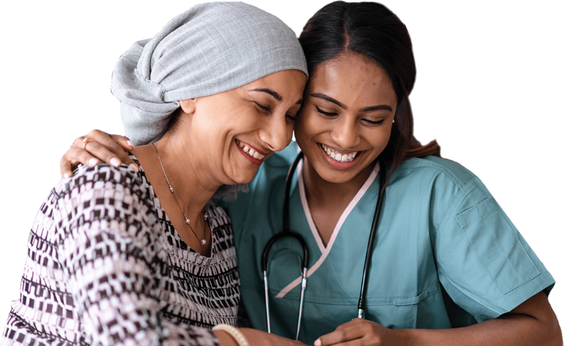 patient and provider smiling and hugging