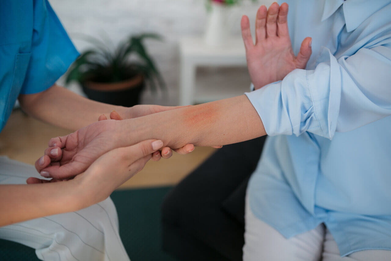 Patient talking to dermatologist about skin condition