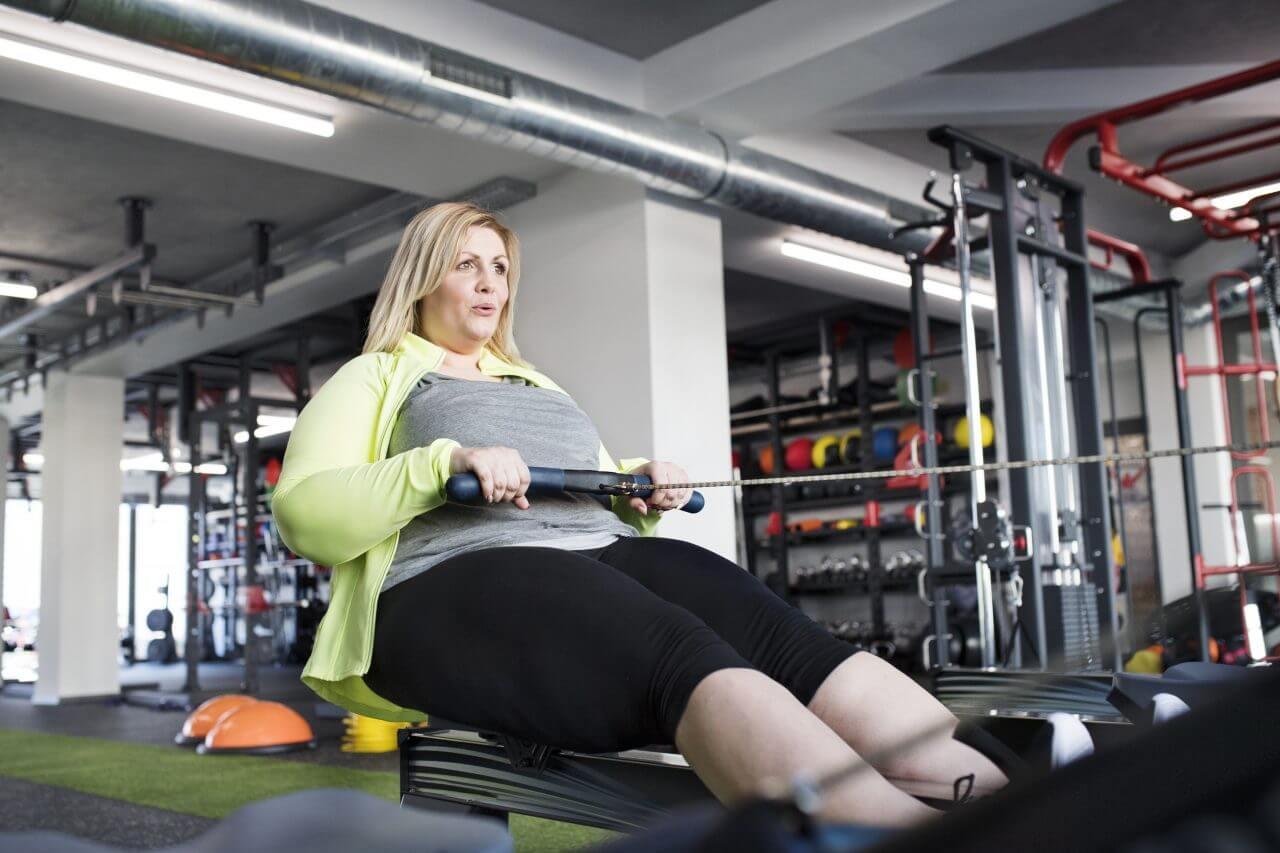 woman on rowing machine