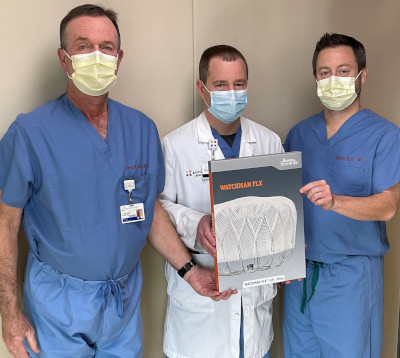 Doctors showing Watchman FLX device
