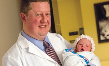 Baptist Health La Grange provider holding baby