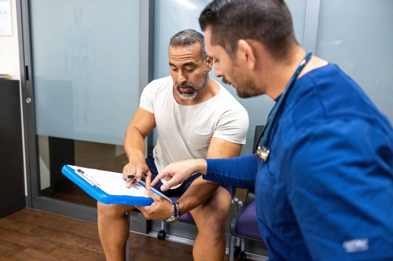 Man speaking with a Doctor