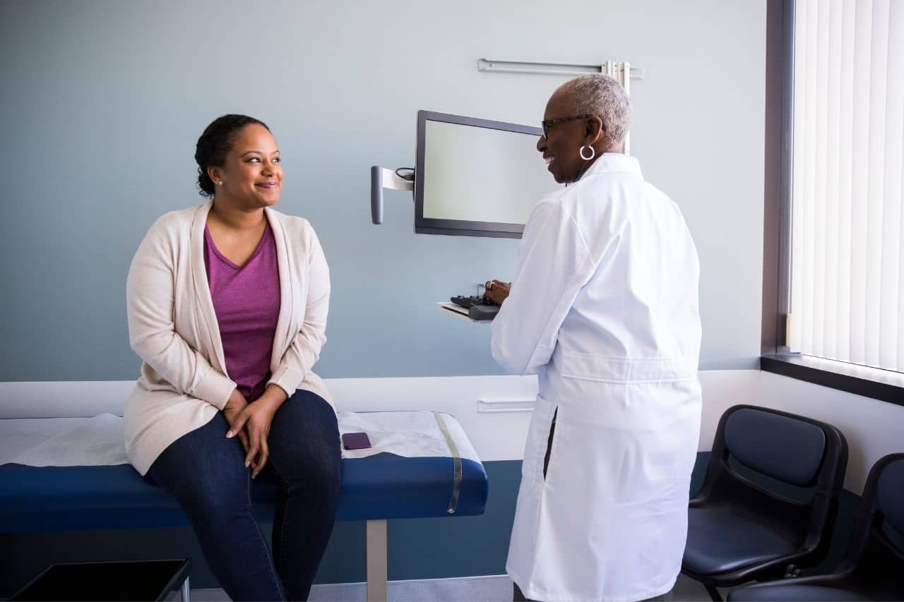 Woman talking to a doctor