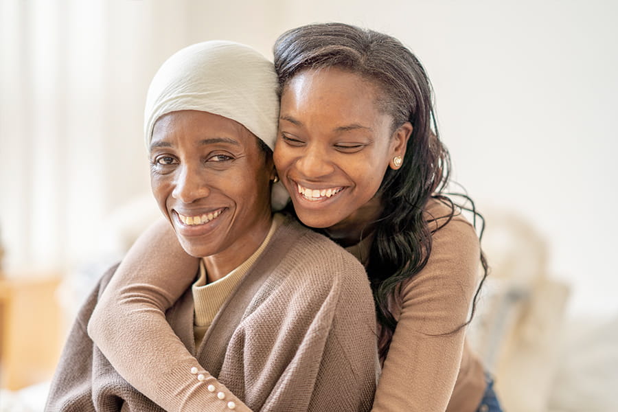 Two women hugging