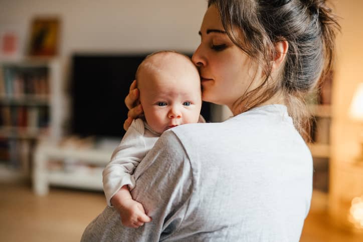 Mother holding baby 